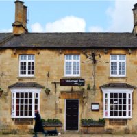 The front of the Volunteer in with traditional costwold stone walls and a rustic slate roof.